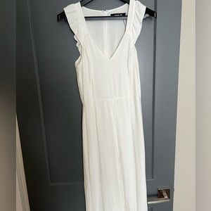 It’s a jumpsuit! Perfect for a rehearsal dinner as a bride or a coastal party!